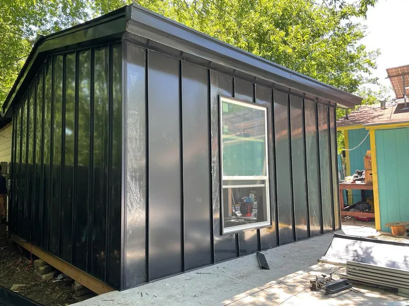 Black standing seam metal wall panels for Roof Inspection in Booneville