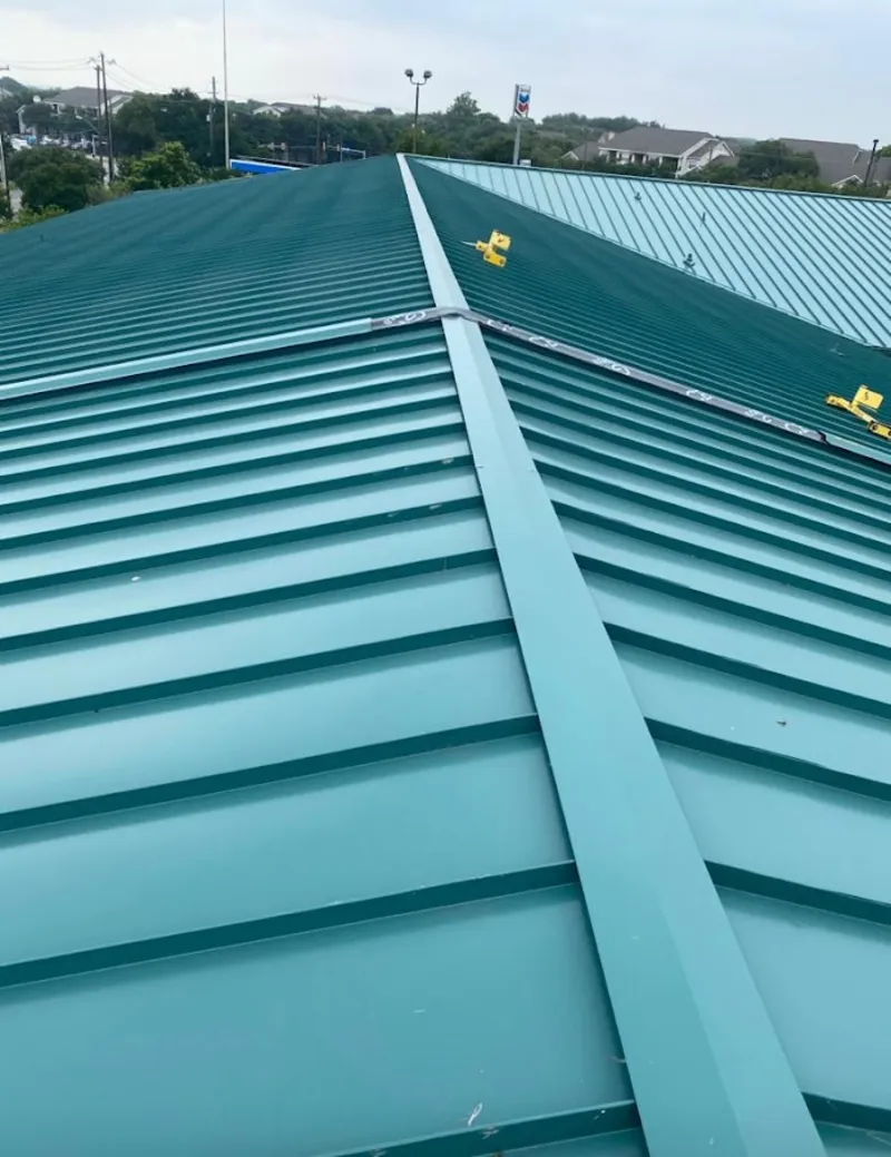 Green commercial metal roof ridge and valley for Metal Roof Repair in Booneville