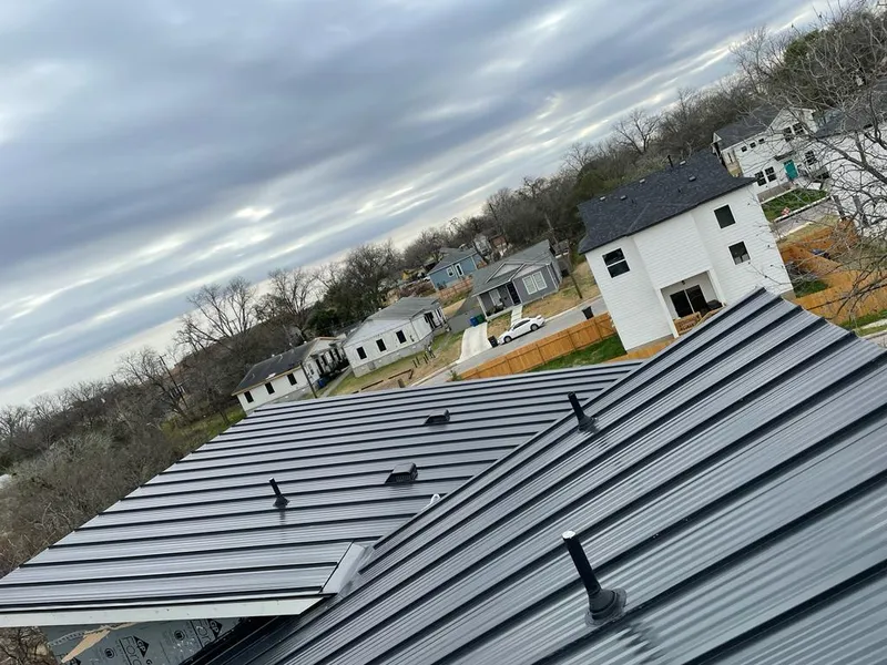 Standing seam metal roof panels with vents for Skylight Repair in Booneville